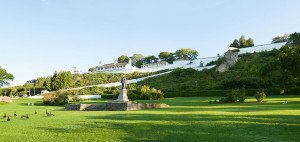 A panoramic view of Fort Mackinac and the Father Marquette Statue from Marquette Park.