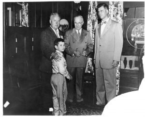 Brian and James Dunnigan with President Truman and Michigan Governor G. Mennen Williams. 1955