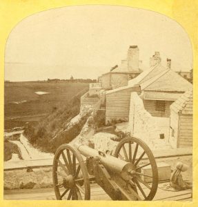 Howitzers, such as the one seen in this mid-1870s photo, had shorter barrels and could fire in a higher arc than a cannon.