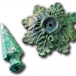A brass helmet spike from uniforms that were adopted in 1881