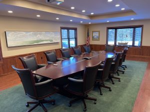 A board table and chairs in the Commission Meeting Room in the Petersen Center, Mackinaw City. 