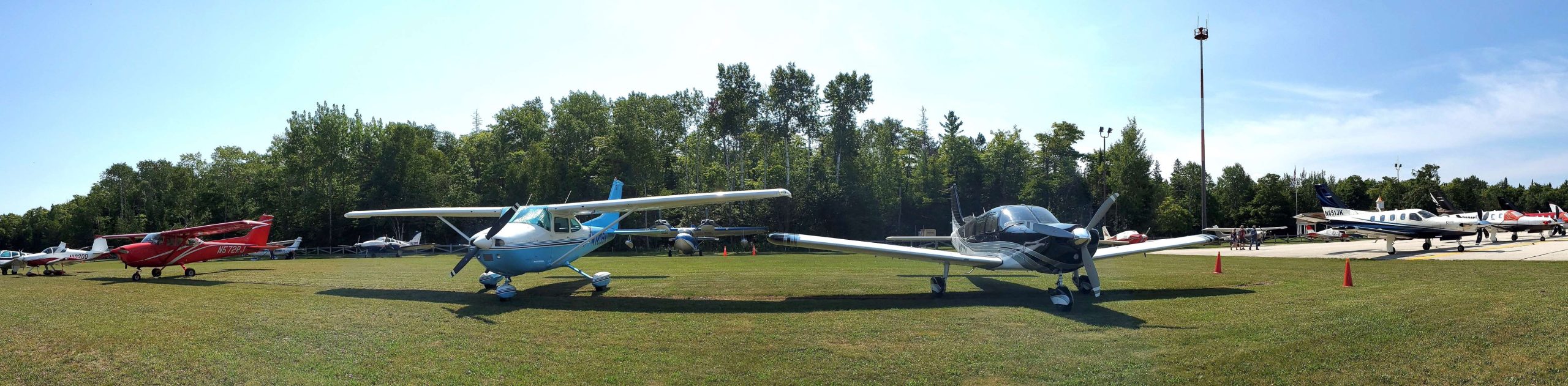 Aircraft parked on the field at Mackinac Island Airport.