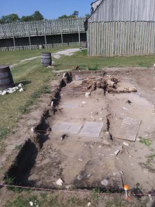 View along the north wall of House E of the Southeast Rowhouse at Colonial Michilimackinac. 