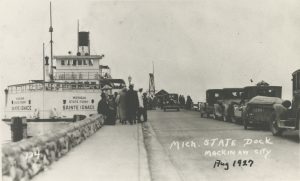 The Sainte Ignace auto ferry at a dock. 