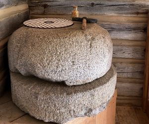 Round millstones made of rock from Mill Creek on display at Historic Mill Creek.