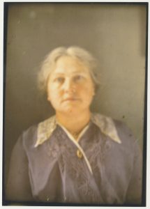 Early autochrome photography of a woman on Mackinac Island. 