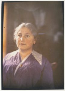 Early autochrome photography of a woman on Mackinac Island. 