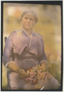 Early autochrome photography of a woman on Mackinac Island. 