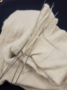 Fine needles on socks used in knitting