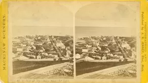 Stereoview, ca. 1870. The original Mackinac Hotel is the fifth building from the corner on the land side of Main Street.