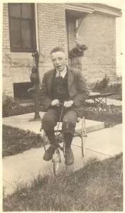 Chester Marshall, nephew of keeper George Marshall, plays near the water pump behind the keepers’ quarters.