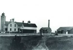 The station grounds as they appeared around 1918. The privy and oil house are located at right. Courtesy State Archives of Michigan