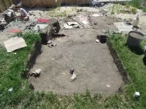 The newly opened quad, showing 1781 demolition rubble and 1960s concrete piers.