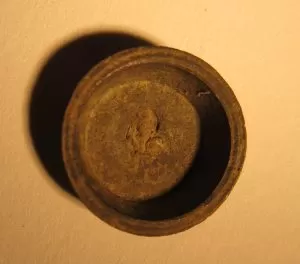 A brass weight